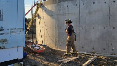 Man injured after falling 25 feet into a concrete tank rescued by an Iowa crane operator